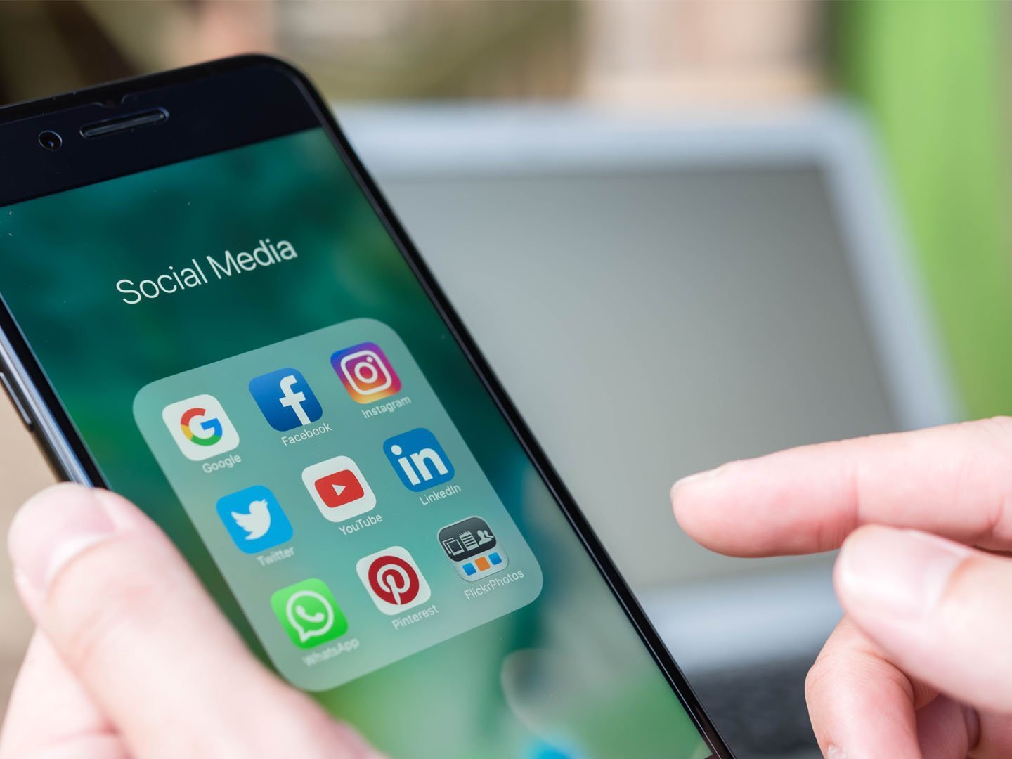 An image of a smart phone showing the user is in the Social Media menu containing nine apps which are Google, Facebook, Instagram, Twitter, Youtube, LinkedIn, WhatsApp, Pinterest, and FlickrPhotos. This is an image relating to the blog article: Five social media tips for B2B Marketers